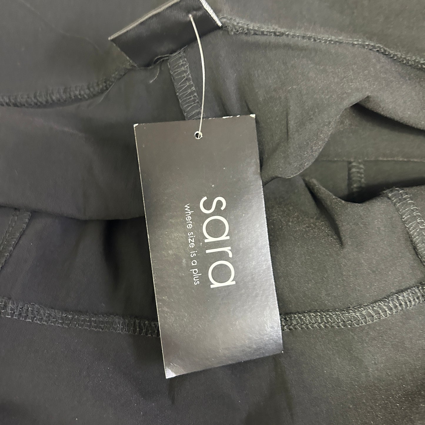Grey garment label detail view