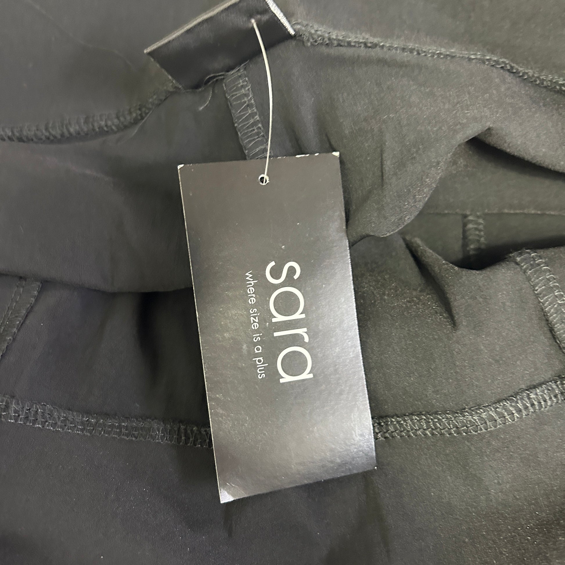 Grey garment label detail view