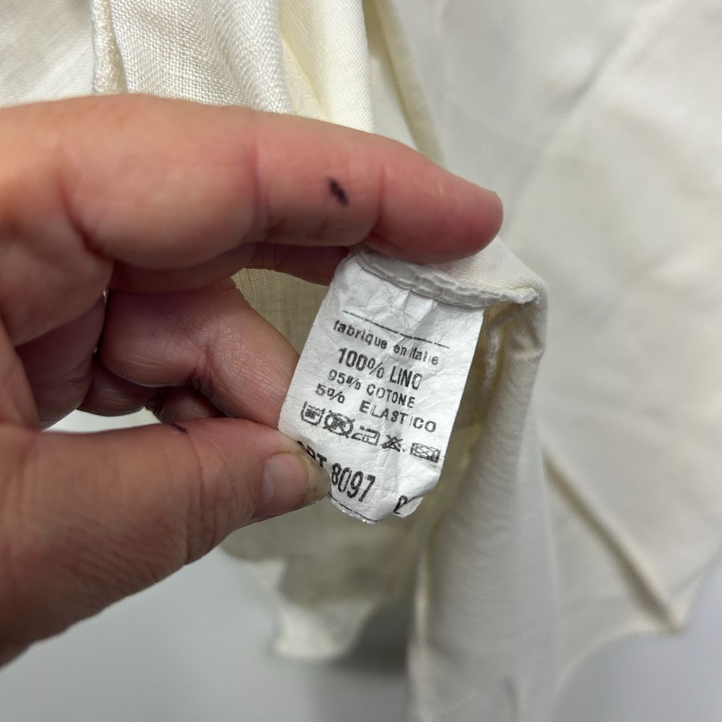 White garment label detail view
