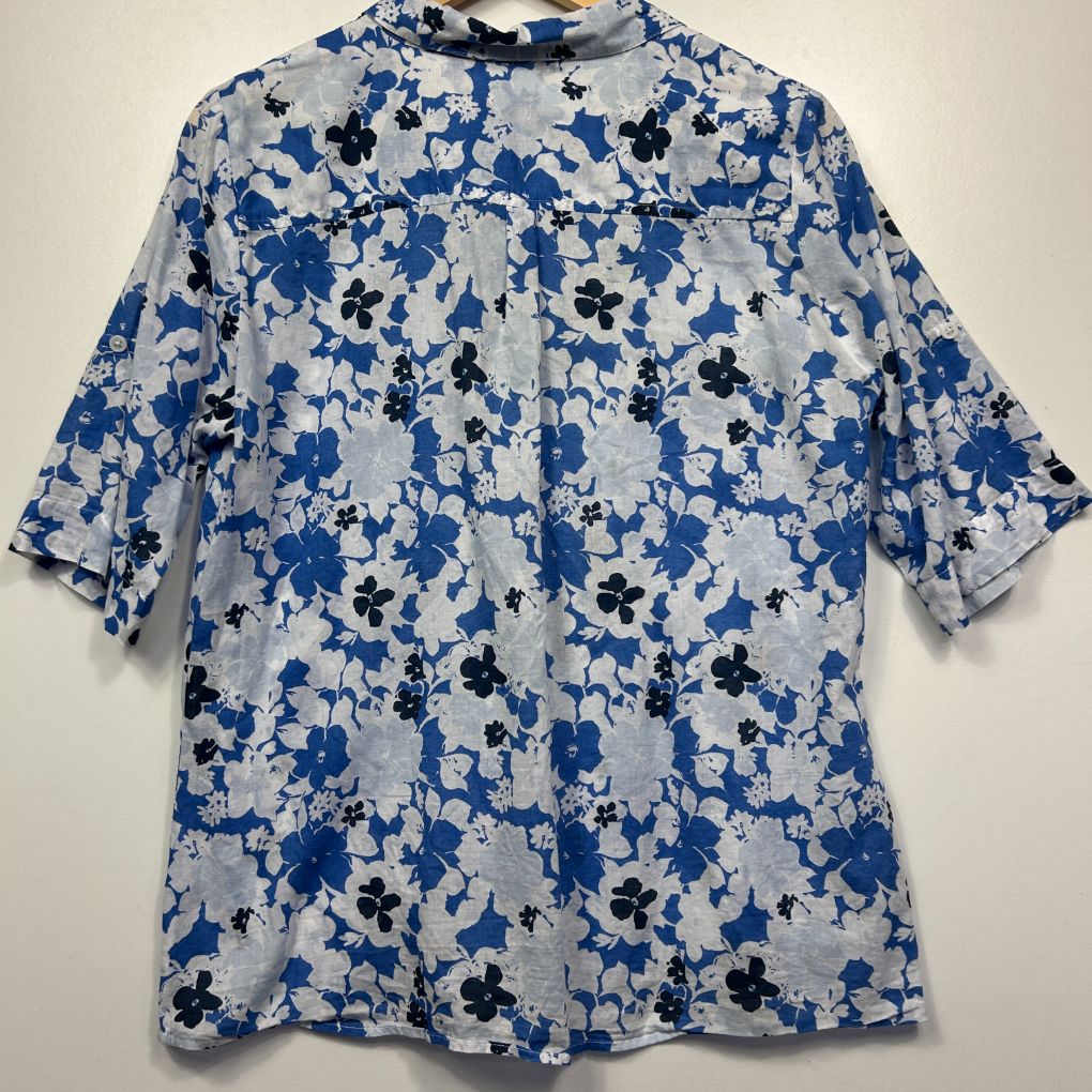 Blue and white floral short sleeve top front view