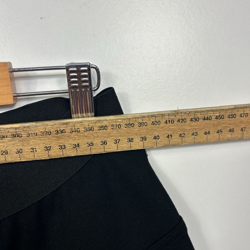 Black pants waist measurement detail view