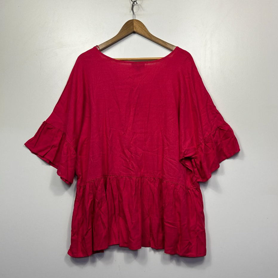 Red peplum top front view
