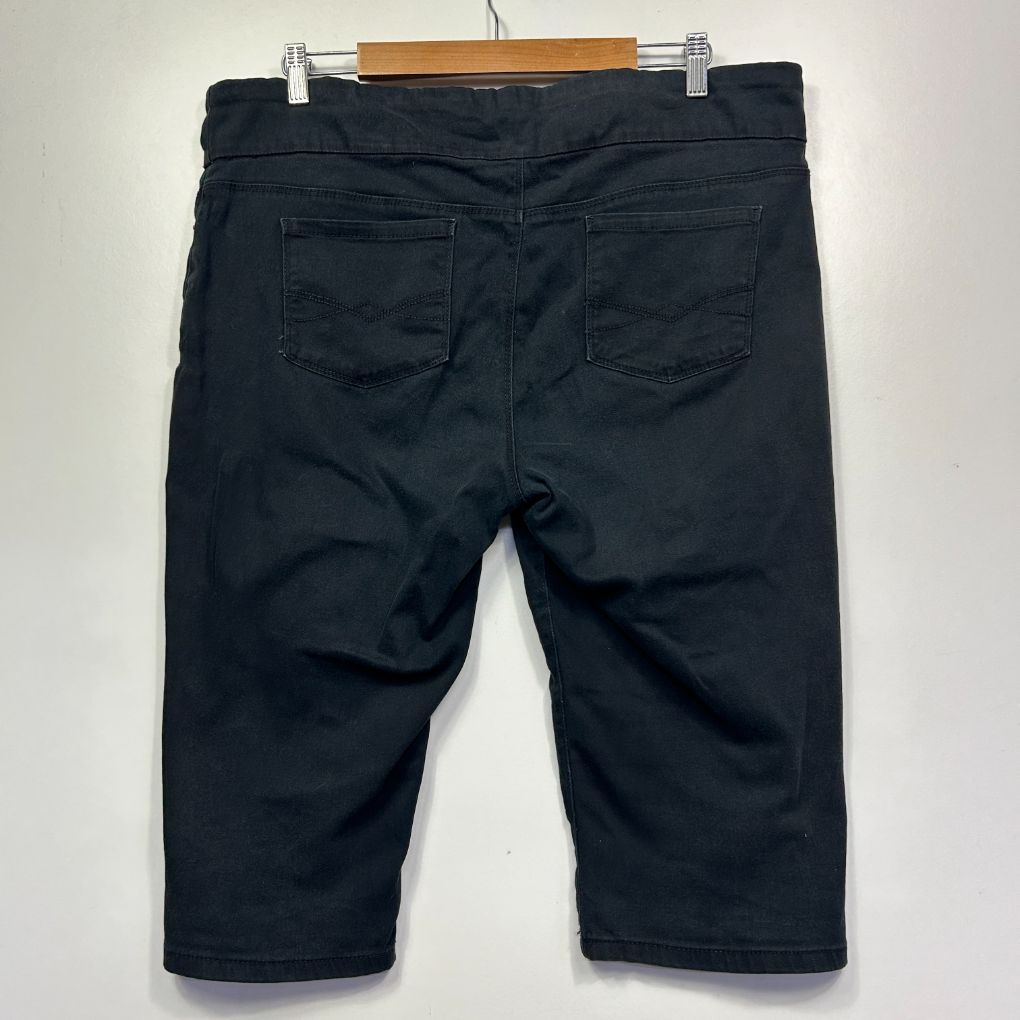 Black denim shorts back view