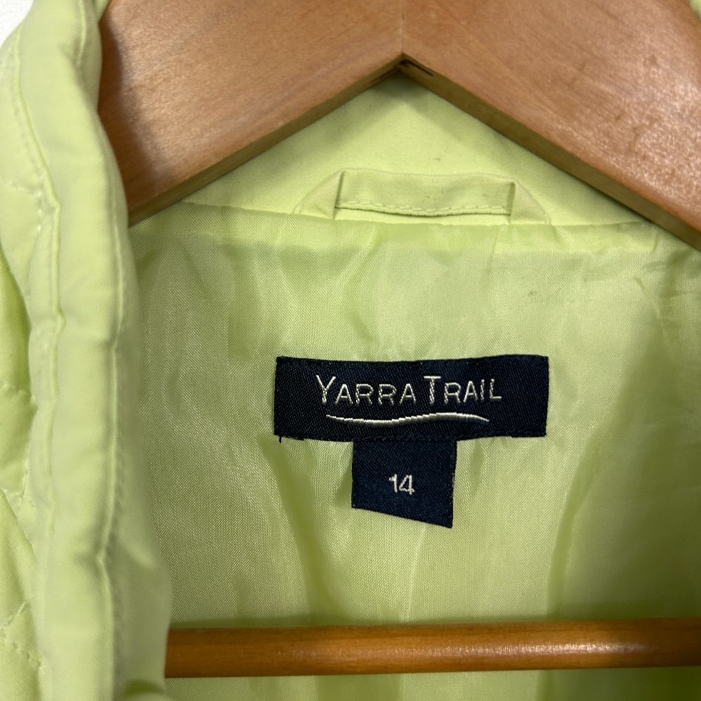 Lime green shirt label detail view