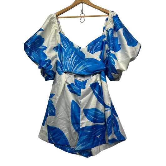 Blue and white floral playsuit front view