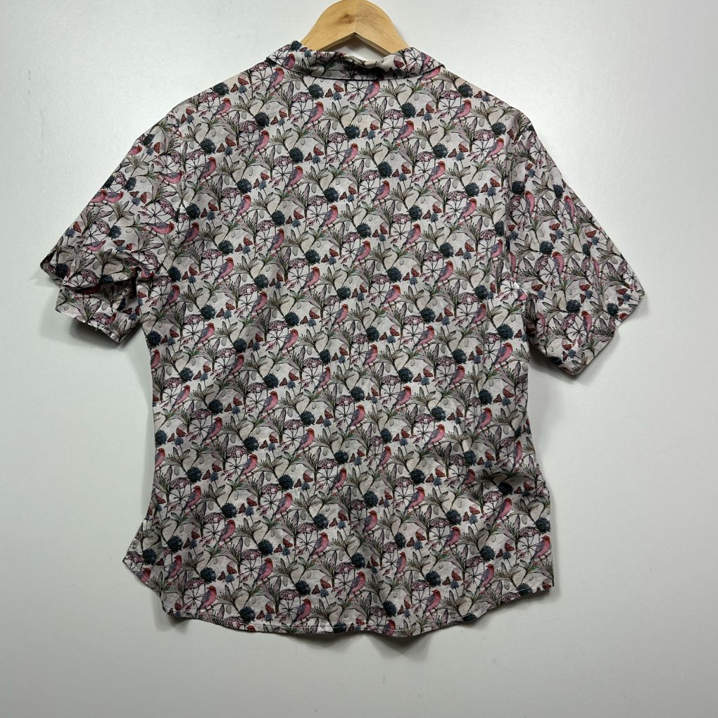 Black floral short sleeve shirt front view