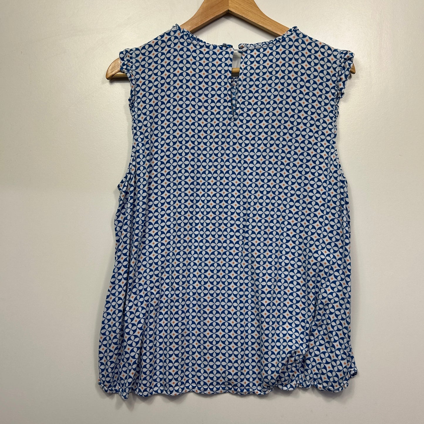 Blue geometric patterned sleeveless top front view