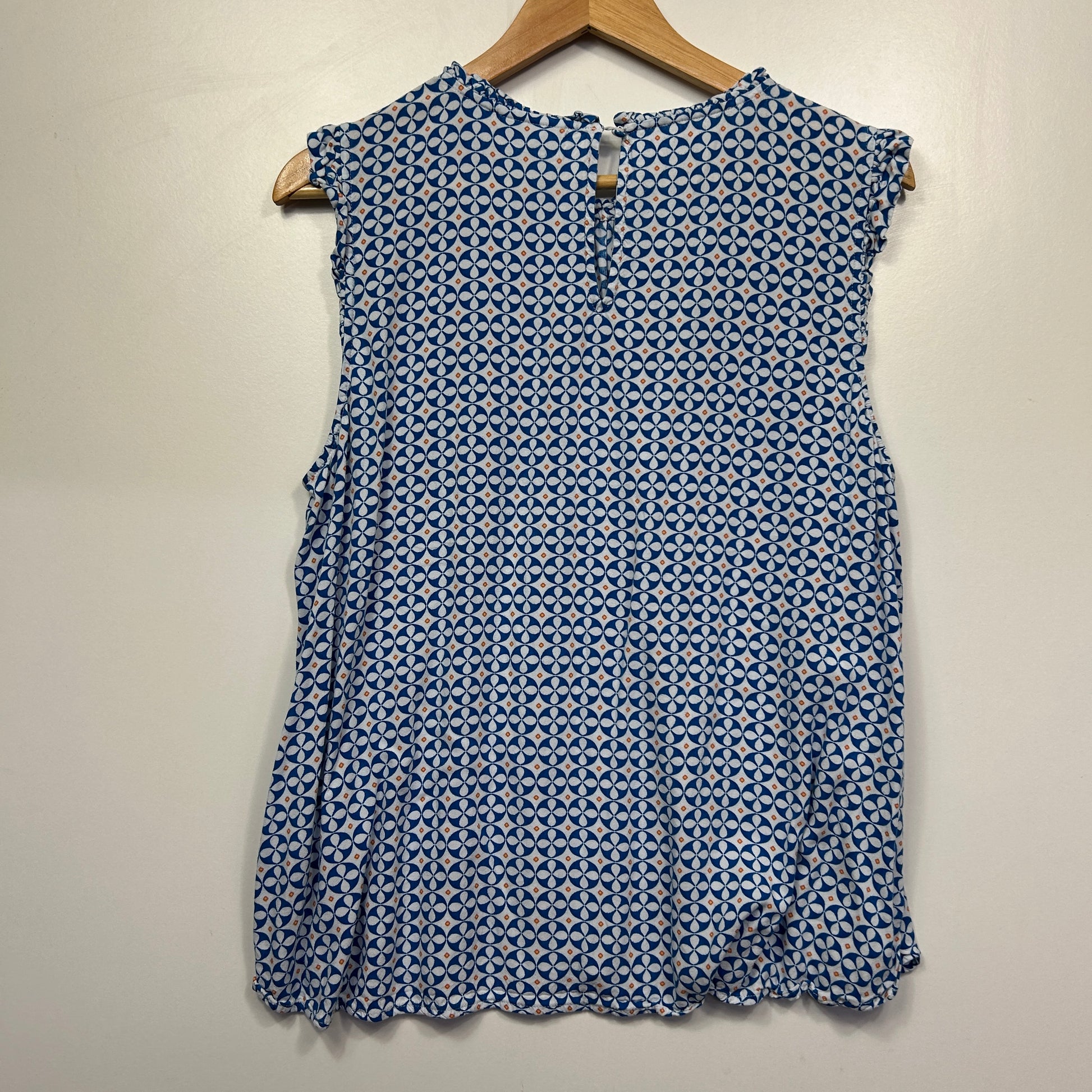 Blue geometric patterned sleeveless top front view