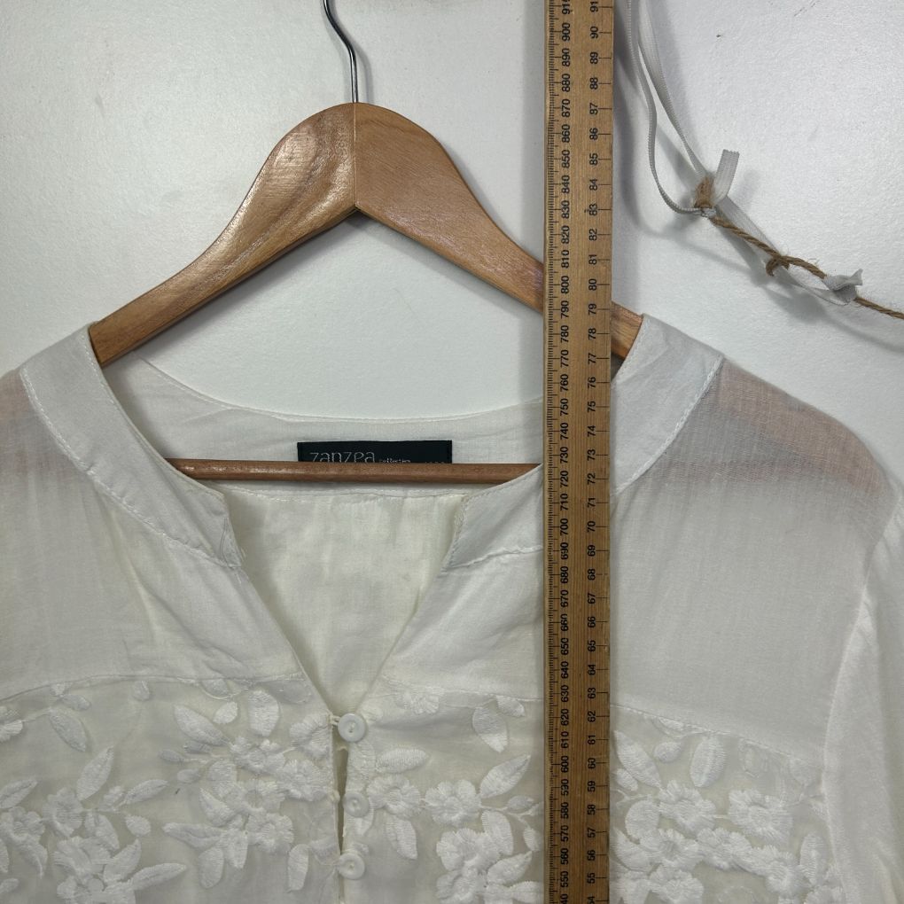 Cream linen blouse front view