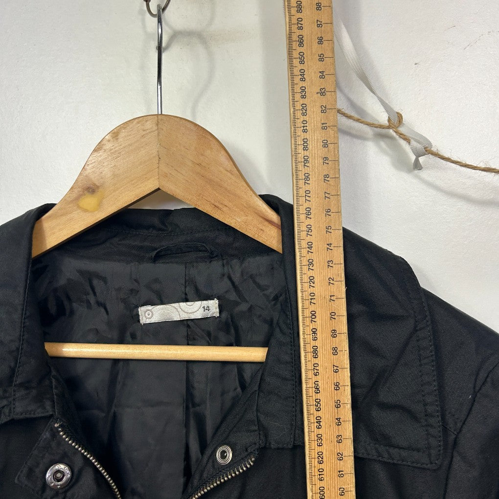 Black jacket front view on wooden hanger