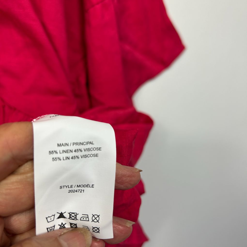 Pink garment label detail view