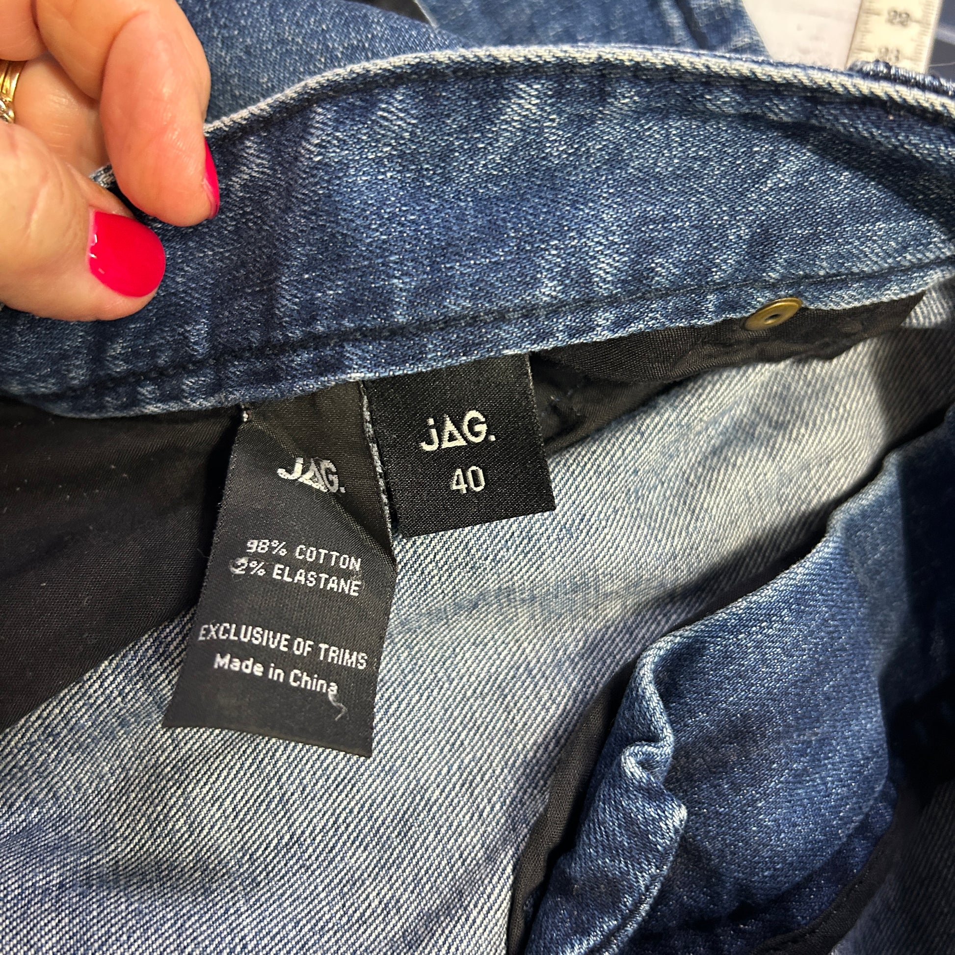 Blue denim jeans label detail view