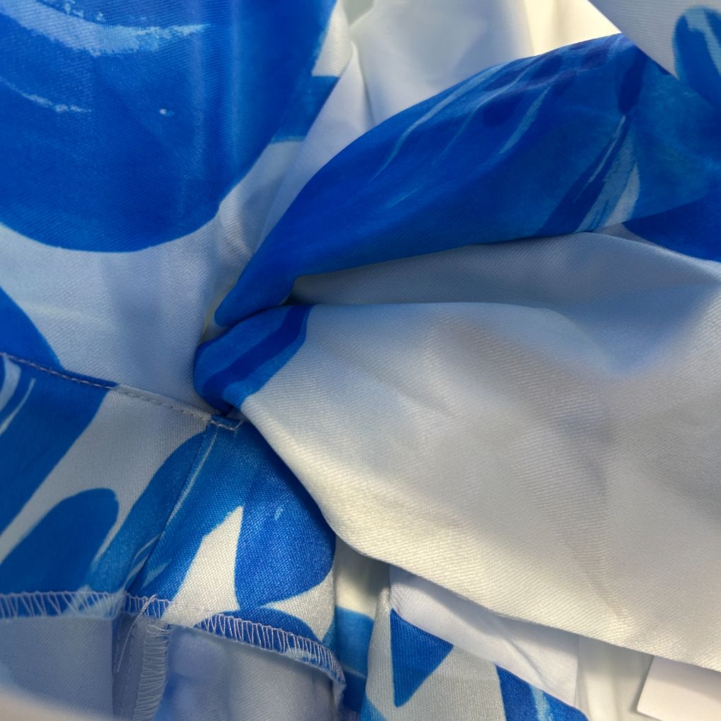 Blue and white graphic print fabric detail view