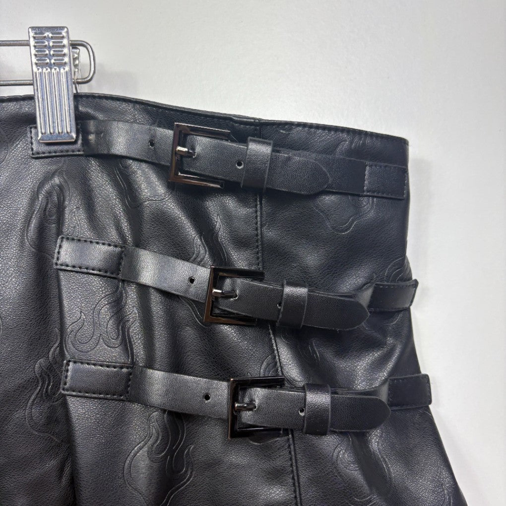 Black leather jacket detail view showing buckle straps