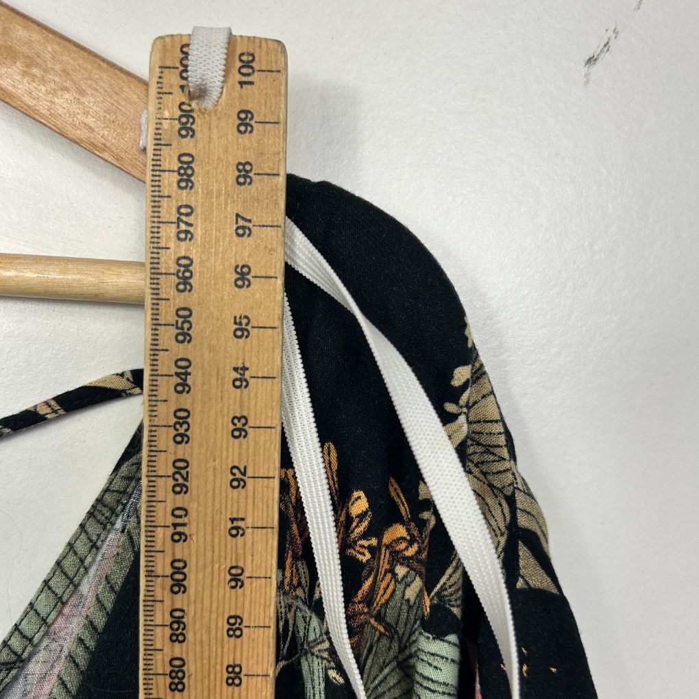 Clothing items with measuring tape detail view