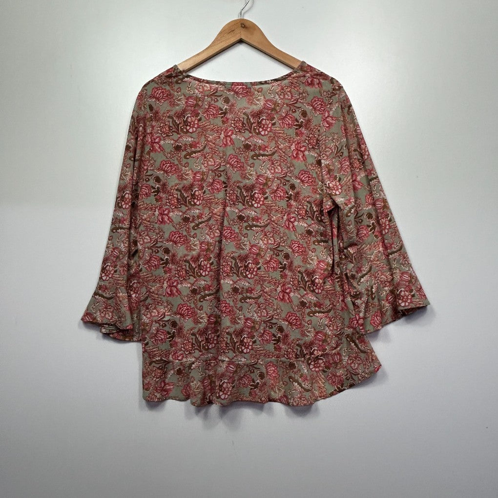 Red floral blouse back view