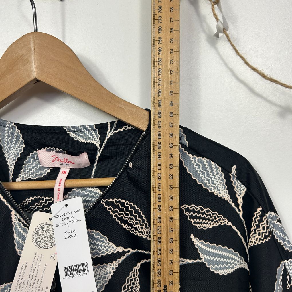 Black top with white leaf pattern front view