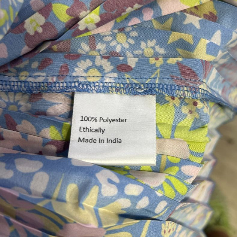 Blue floral garment label detail view