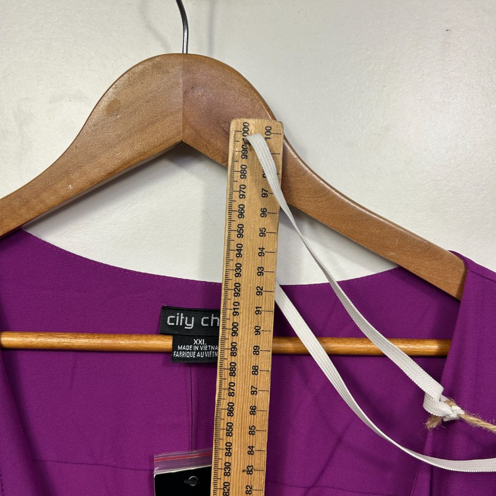 Purple top front view on wooden hanger
