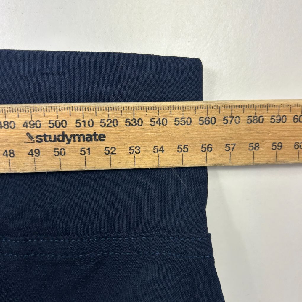 Navy blue pants with measuring tape detail view