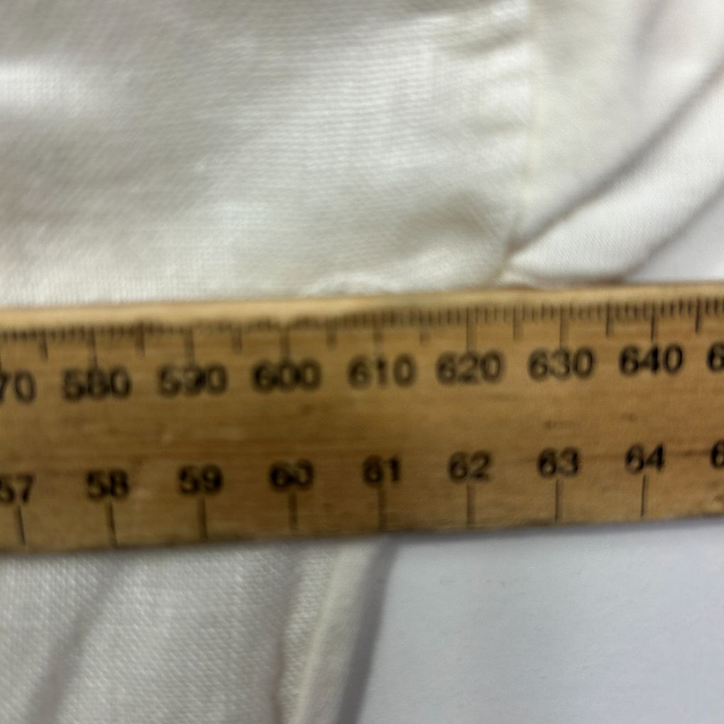Cream fabric with measuring ruler detail view