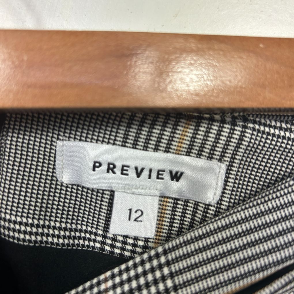 Black and white gingham check shirt label detail