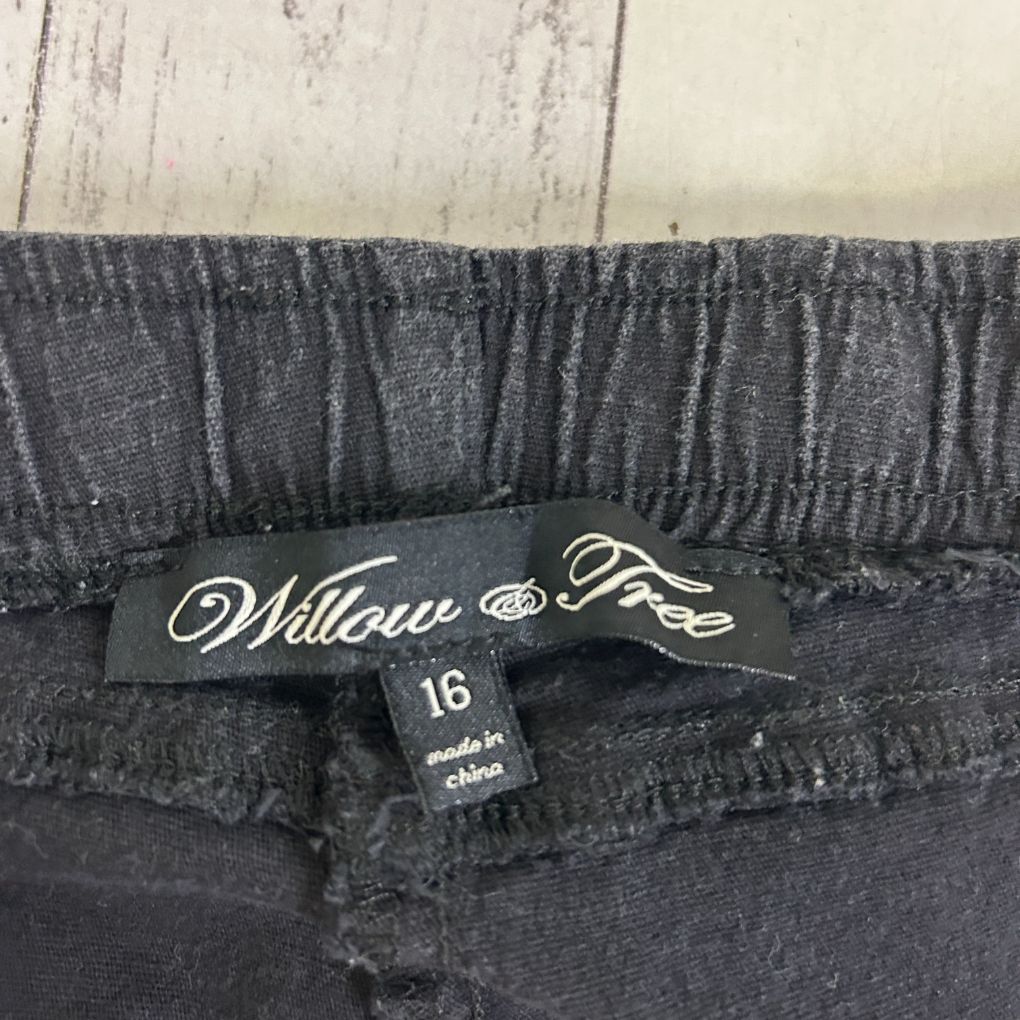 Black pants waistband detail view