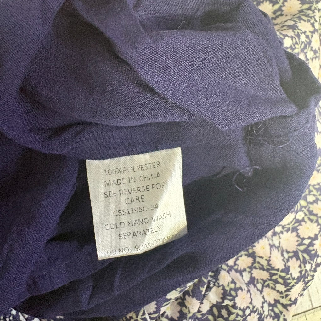 Purple polyester garment label detail view