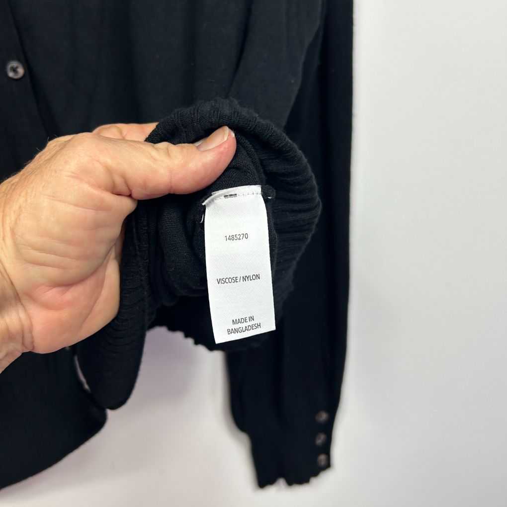 Black cardigan label detail view
