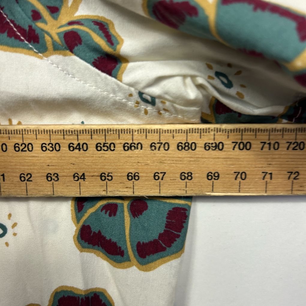 Cream fabric with colorful floral graphic detail view