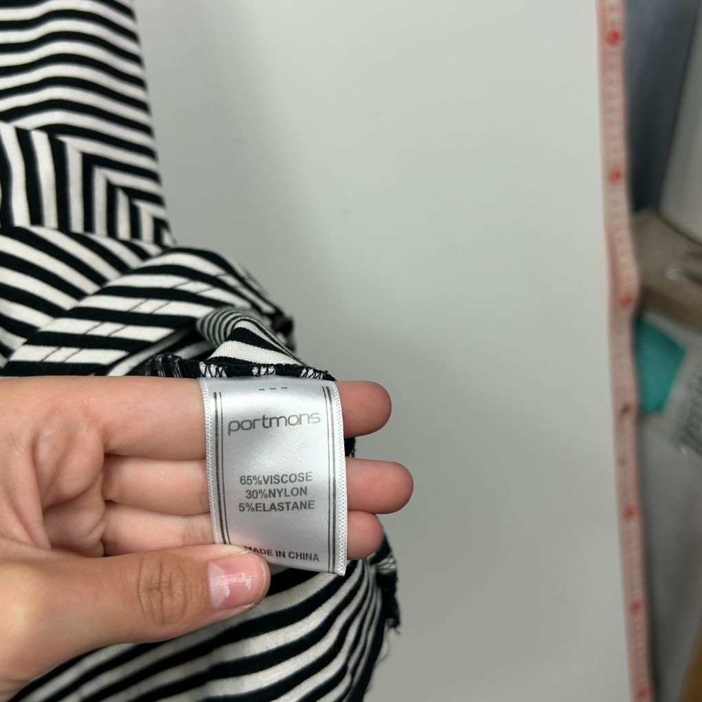 Black and white striped top label detail view