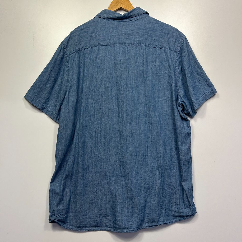 Blue denim shirt back view