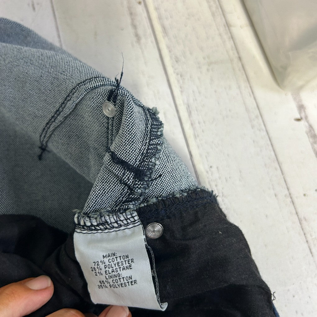 Grey and black colorblock sweater detail view