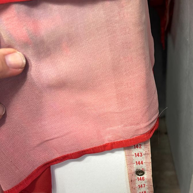 Pink top with red trim front view