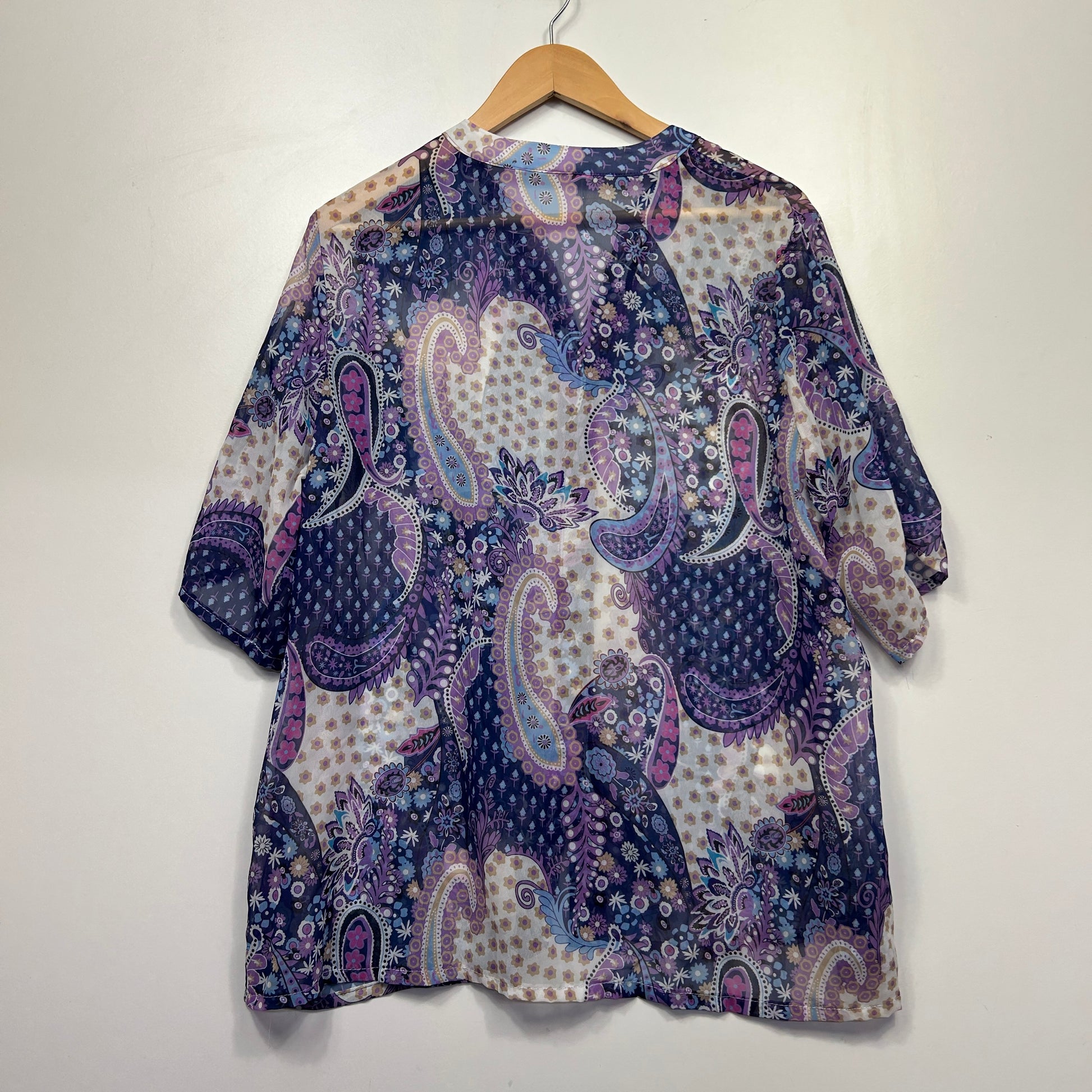 Purple and white paisley patterned tunic top front view