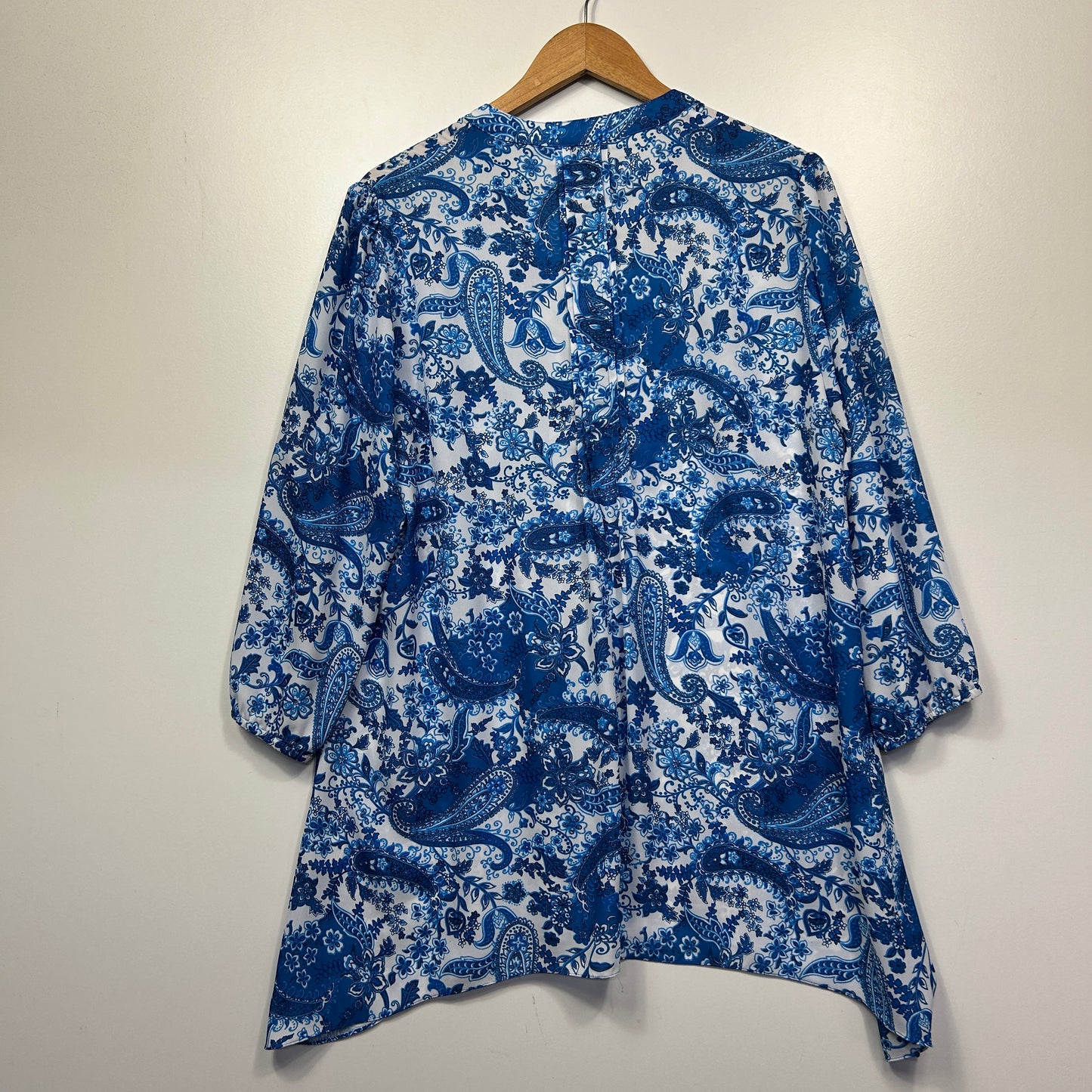 Blue and white floral tunic top back view