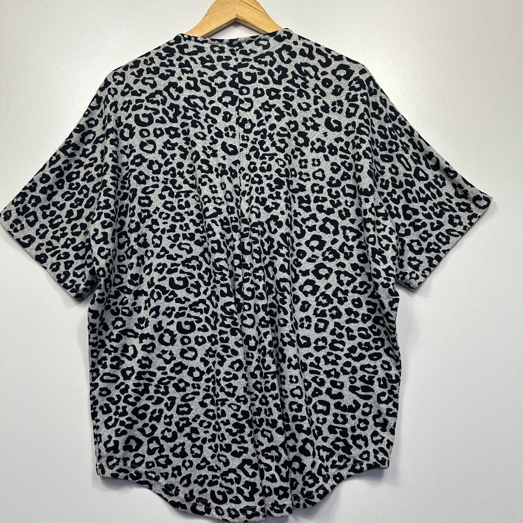Grey and black leopard print short sleeve shirt back view