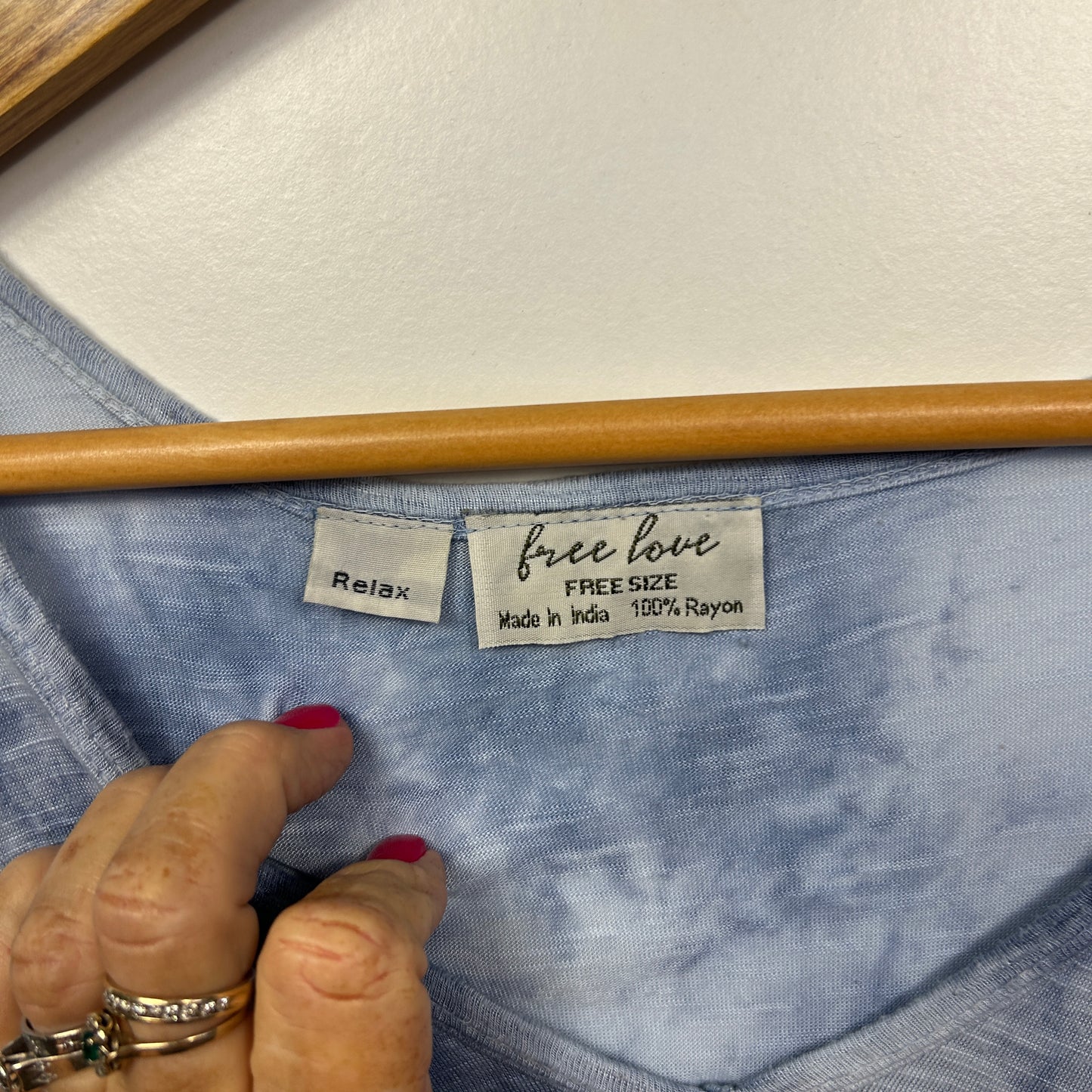 Blue tie dye top label detail view