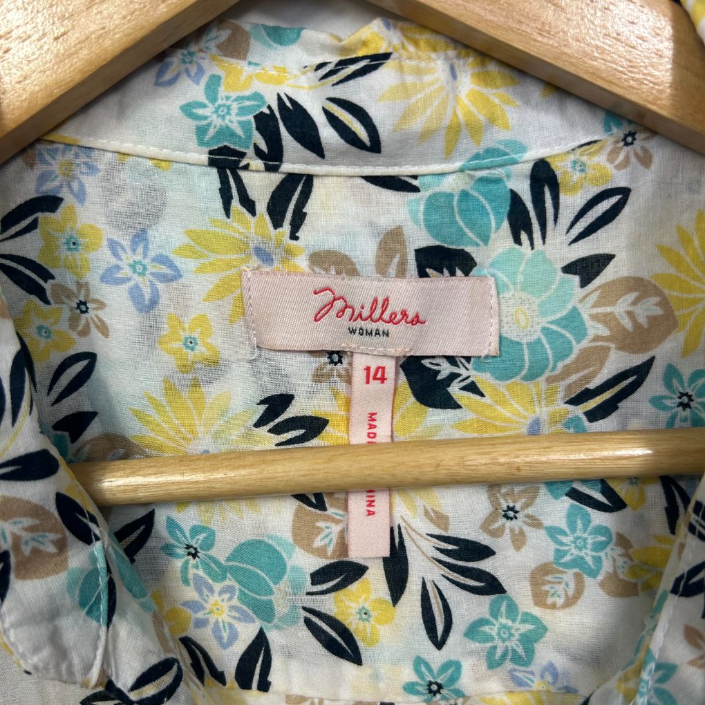 Floral shirt label and hanger detail view