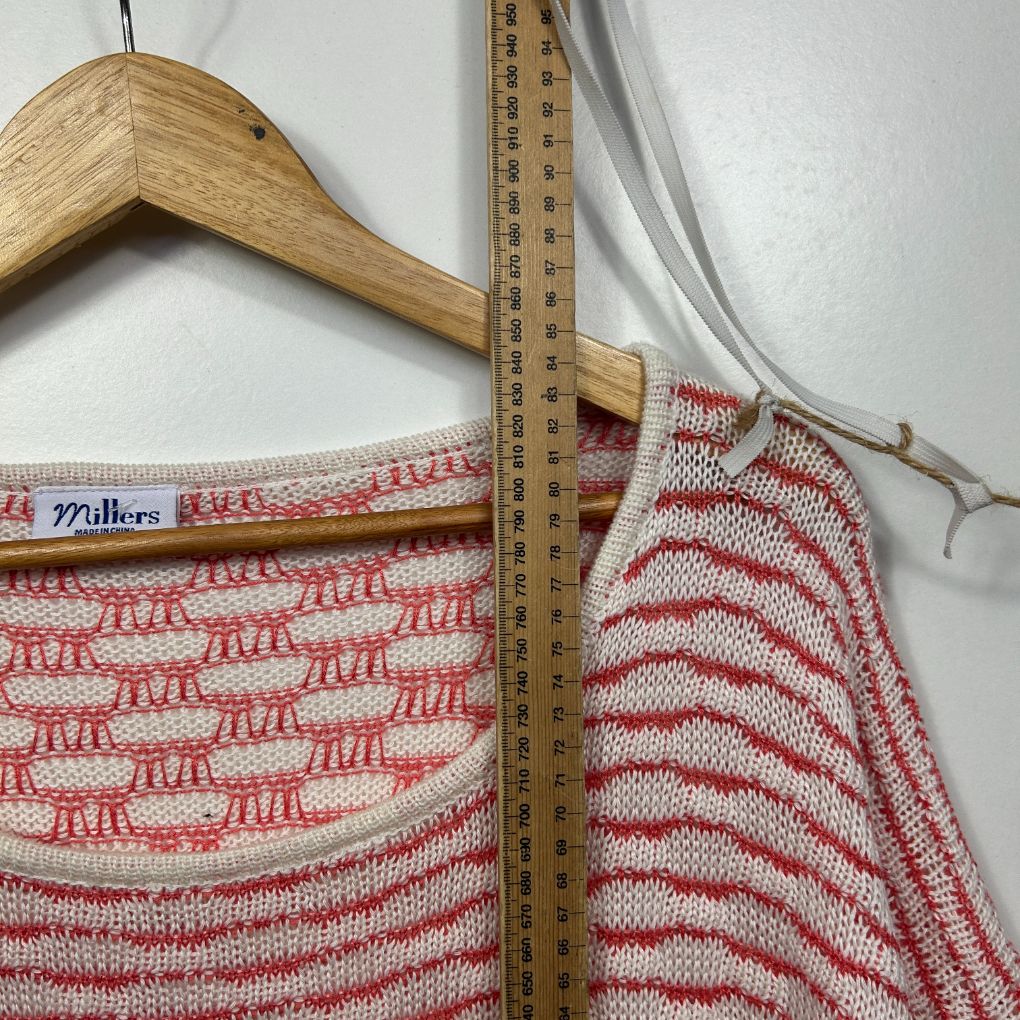 Red and cream striped knit top detail view