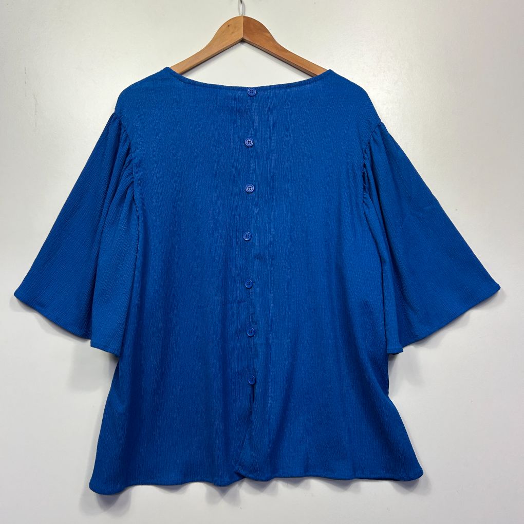 Blue button-up top front view