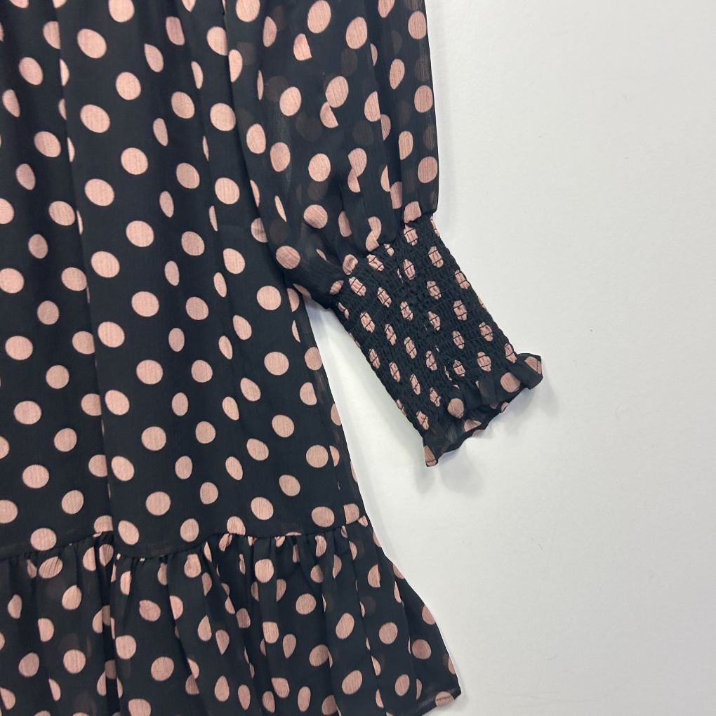 Navy polka dot dress detail view