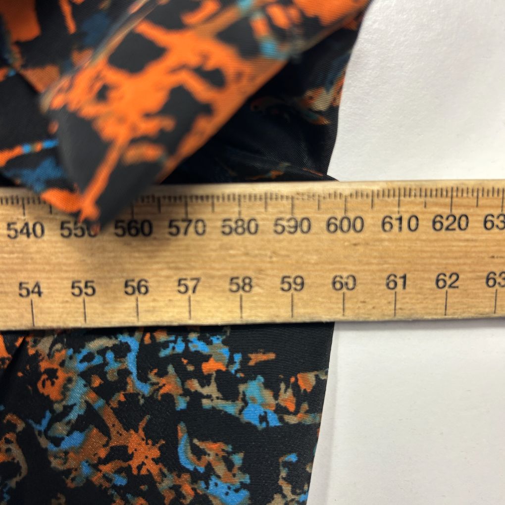 Orange and blue graphic fabric detail view