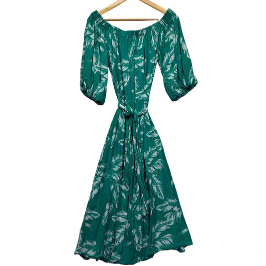Green floral dress front view on hanger
