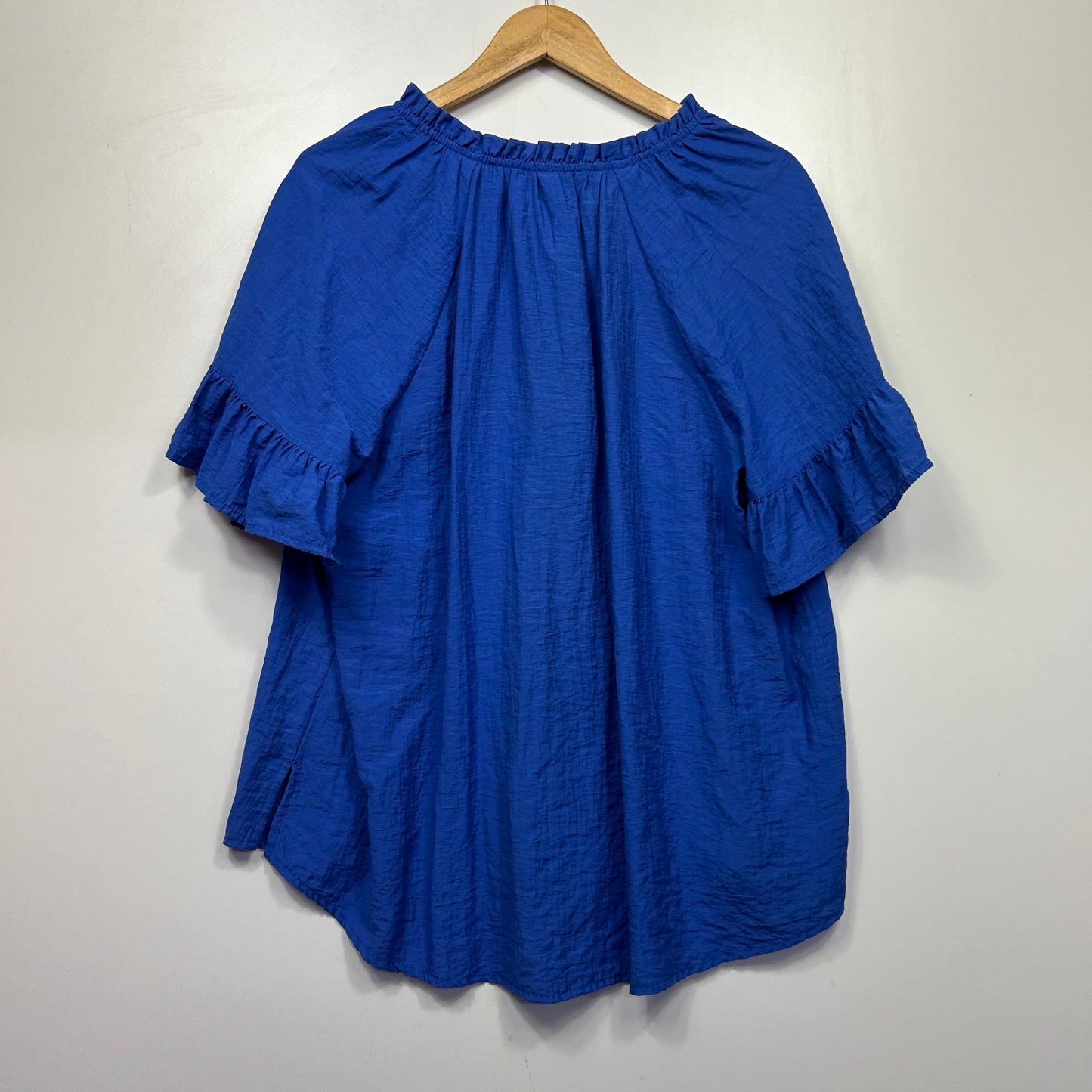 Blue ruffle sleeve top front view