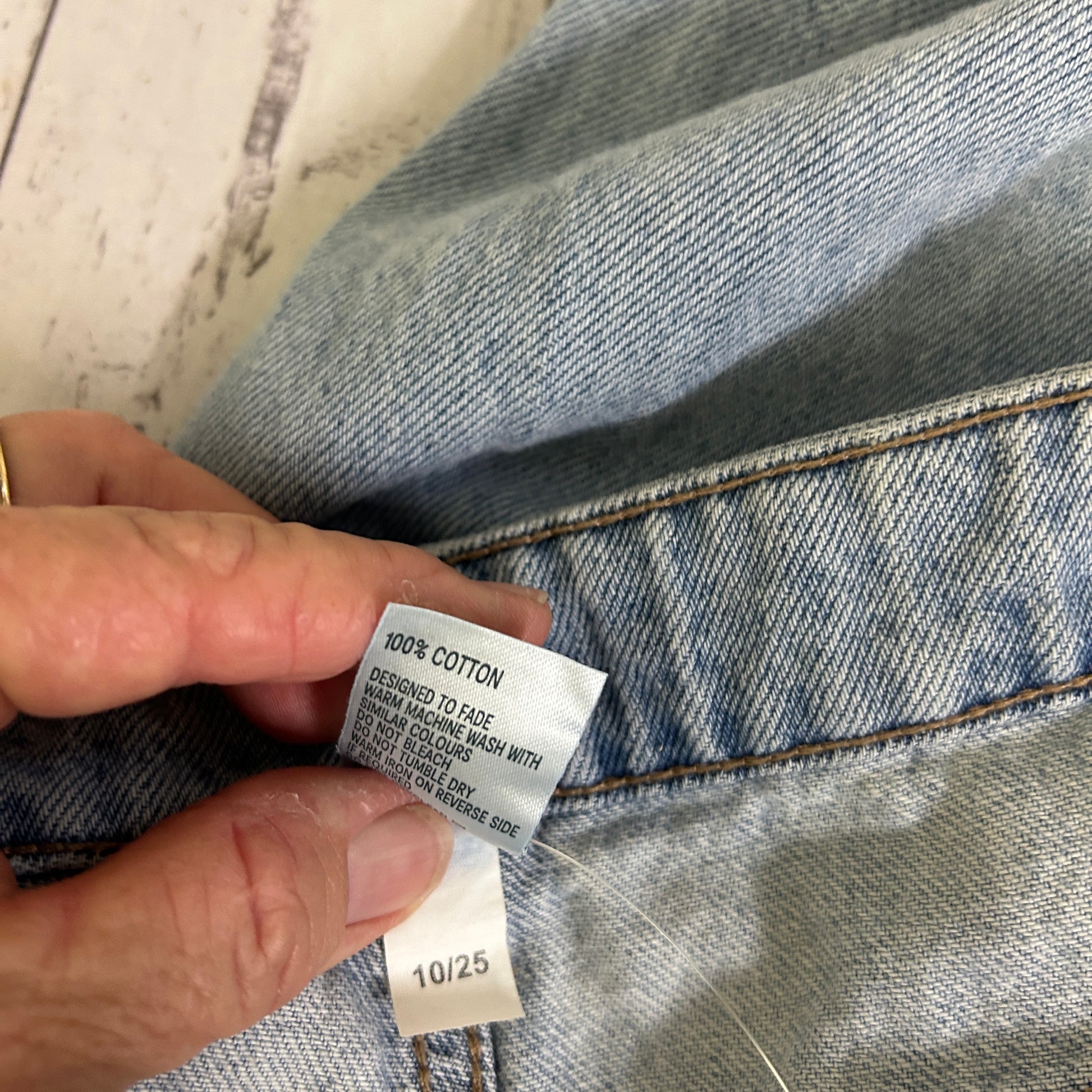 Blue denim jeans label detail view