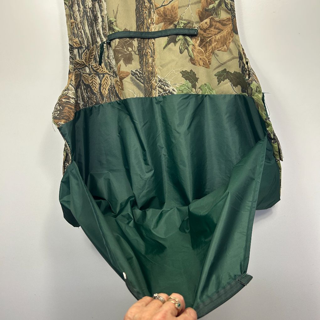 Green and camouflage jacket back view