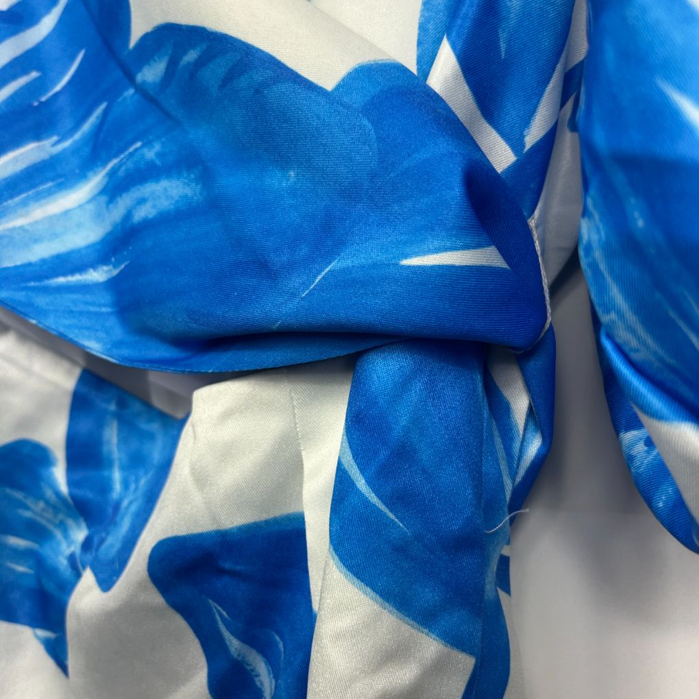 Blue and white floral scarf detail view