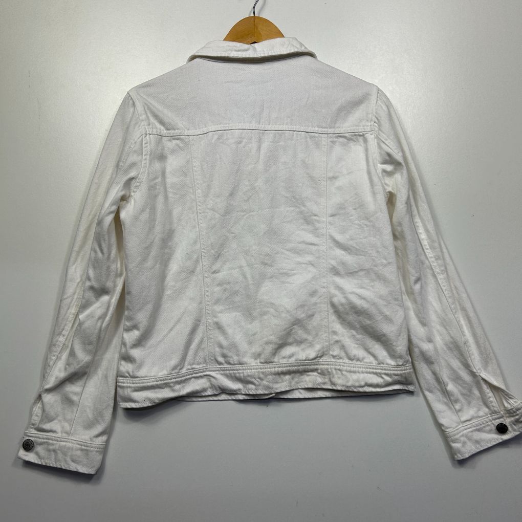 White denim jacket back view