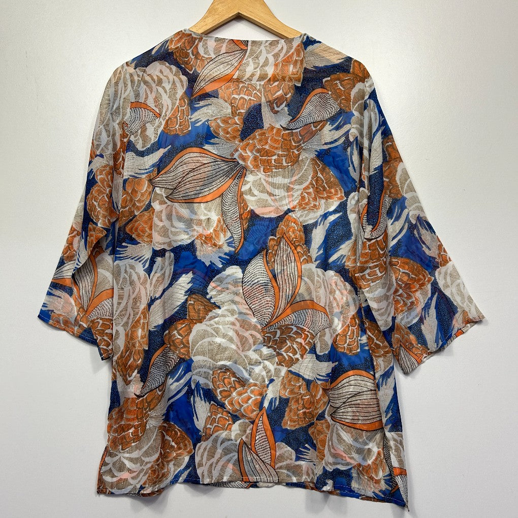 Blue orange and cream fish patterned shirt front view